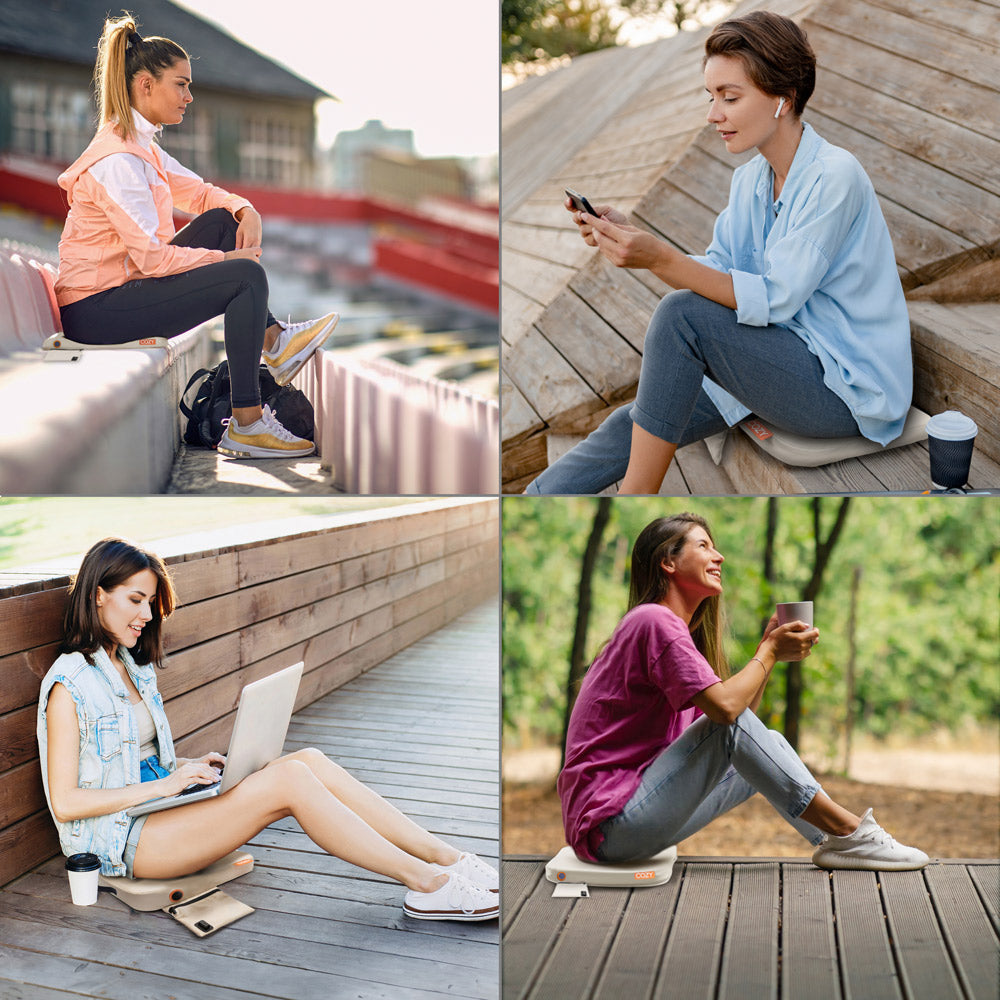 Four women enjoy the outdoors on wooden benches, each using the COZY Cordless Heated Seat Pad - JORD by Cozy Cushion EU while listening to music, working on a laptop, using a phone, or sipping coffee.