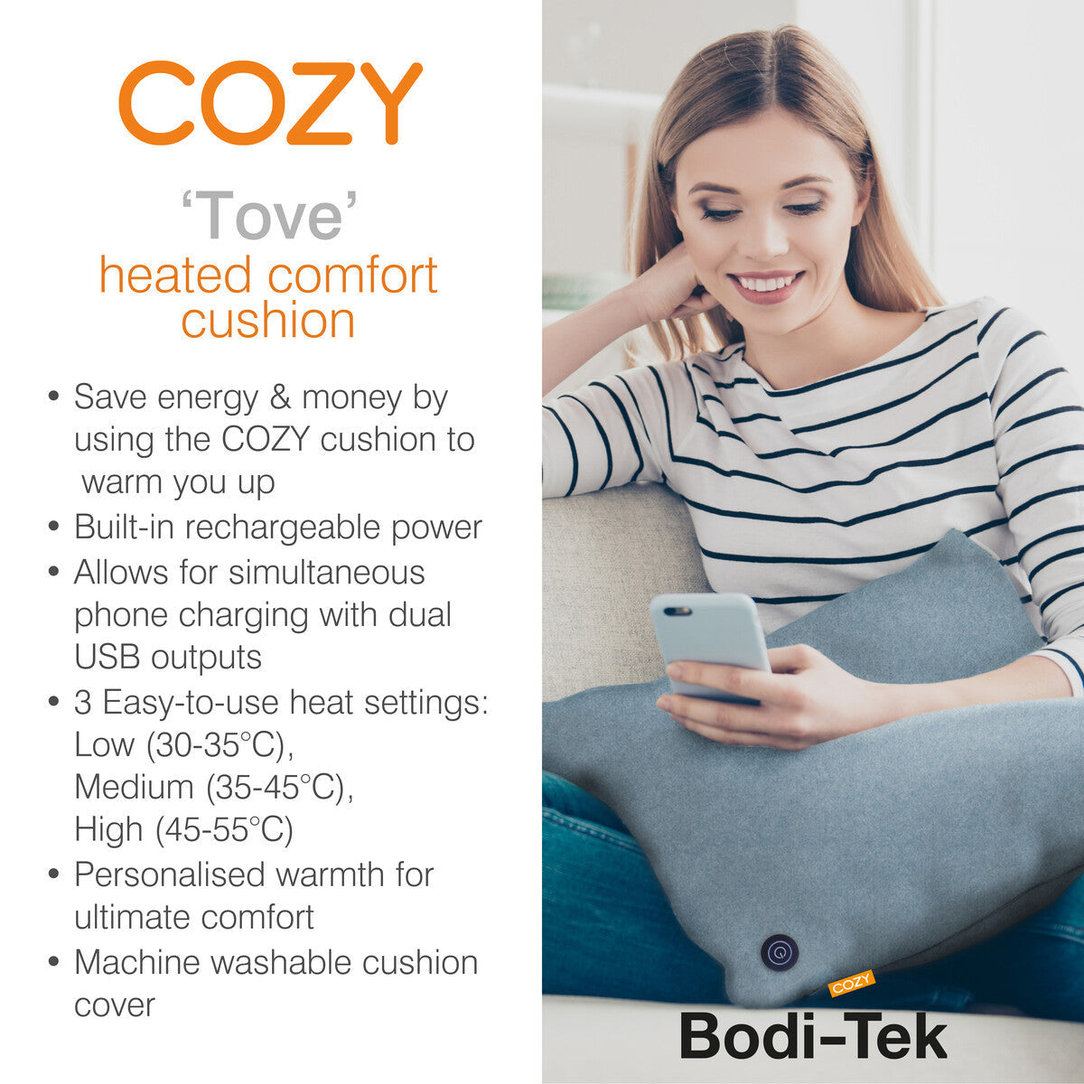 A woman sits on a couch holding a smartphone, with the Cozy Cushion COZY Heated Cushion Cordless - TOVE (60cm x 45cm) on her lap. Text highlights heat settings, USB charging, and a washable cover.