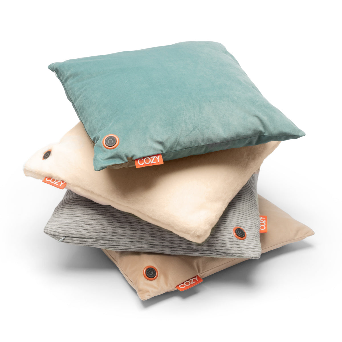 Four square COZY Heated Cushion Cordless - UNA Faux Fur pillows (45cm x 45cm) by Cozy Cushion EU, each in different colors and textures with an orange COZY tag and corner button, feature rechargeable cordless heating and are shown on a white background.