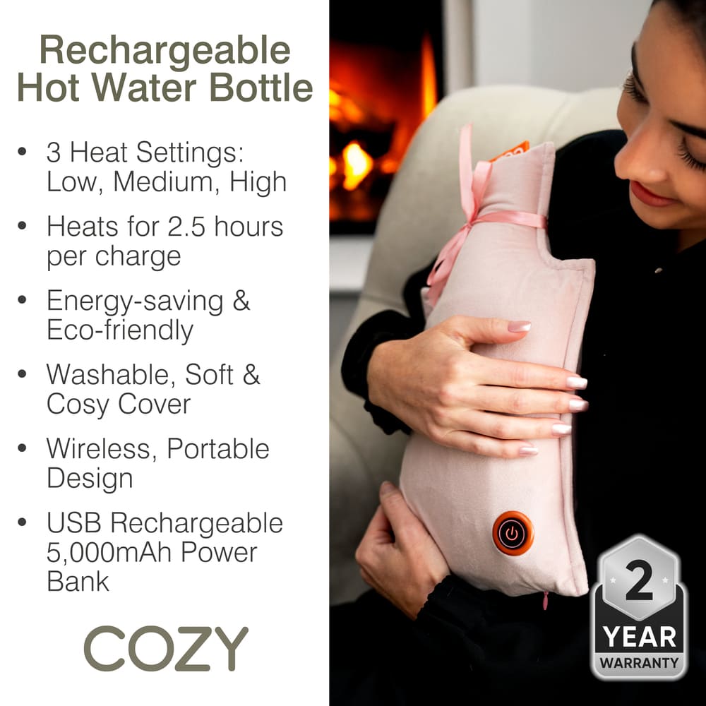A woman holds the UNA Rechargeable Hot Water Bottle by Cozy Cushion EU. Enjoy wireless warmth with 3 heat settings, 2.5-hour heating, eco-friendly design, washable cover, portable USB charging, and a 2-year warranty.